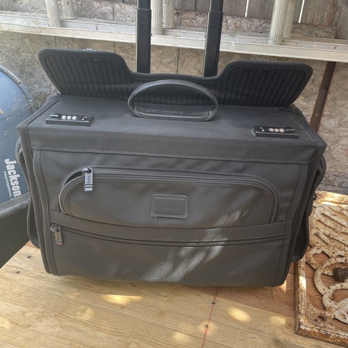 Needs repair preowned tumi - repair, usa